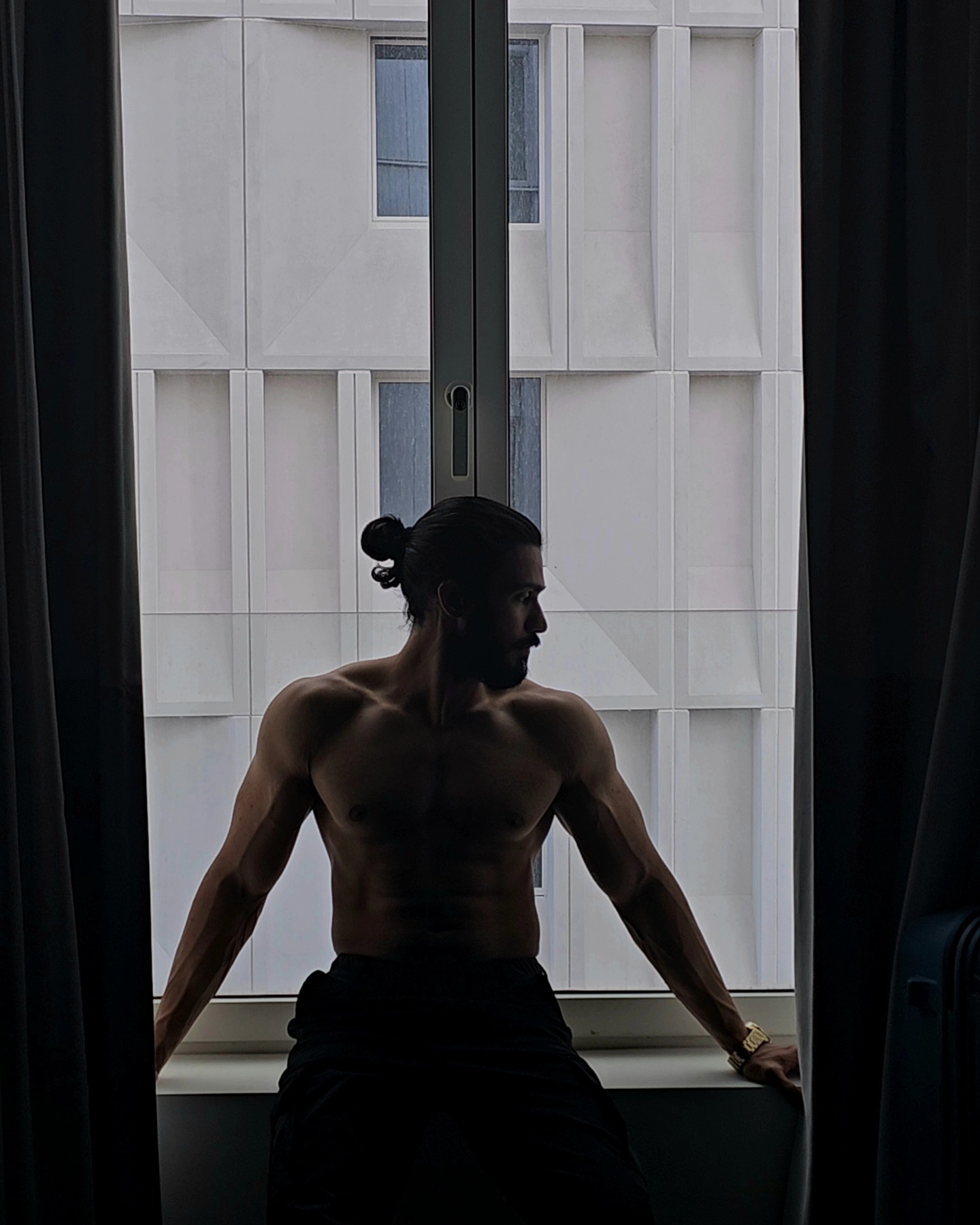 A quiet portrait of Kedar Kuchekar by the window